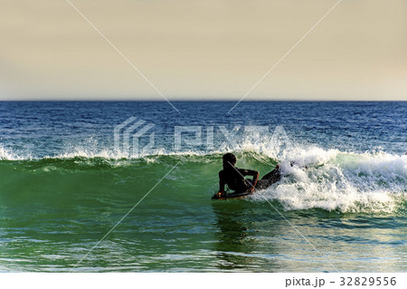 Bodyboarder in Ipanema at afternoon 32829556