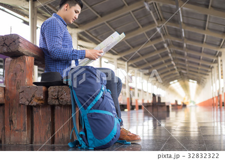 man traveler with backpacker search location map 32832322
