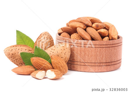 heap of almonds in their skins and peeled with heap of almonds in their skins and peeled with 32836003
