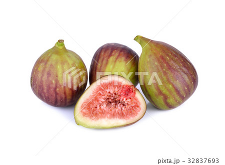 whole and half cut ripe fig on white background whole and half cut ripe fig on white background 32837693