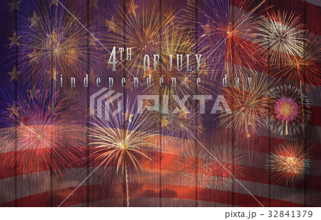 Multicolor Fireworks Celebrate over the United state of America USA flag on the wooden background, Independence day concept 32841379