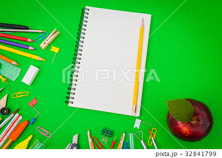 School supplies on Green chalkboard " Back to school background " . School supplies on Green chalkboard " Back to school background " . 32841799
