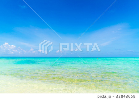 Beautiful tropical Maldives island with white sandy beach and sea . 32843659