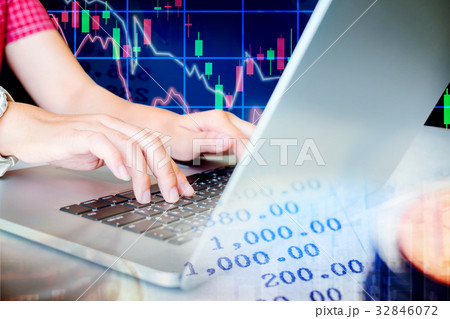 Woman working Laptop Stock market exchange  32846072