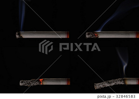 Lit and burning cigarette with smoke Lit and burning cigarette with smoke 32846583