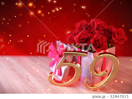 birthday concept with red roses in gift on wooden 32847015