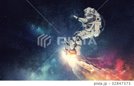 Spaceman on flying board. Mixed media 32847373