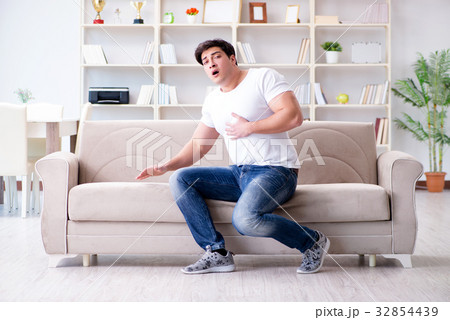Man suffering from sick stomach and vomiting Man suffering from sick stomach and vomiting 32854439
