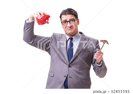 Businessman breaking piggybank isolated white Businessman breaking piggybank isolated white 32855593