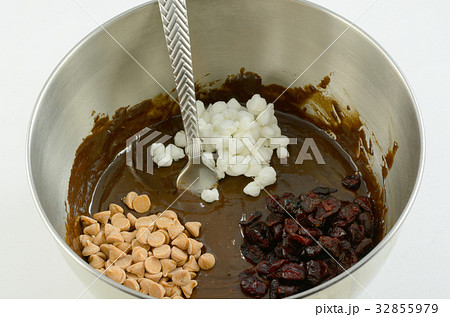 Brownie or cake mix with ingredients on top Brownie or cake mix with ingredients on top 32855979