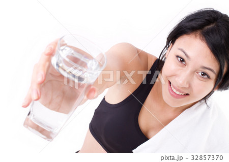 smiling, happy, healthy woman giving fresh water smiling, happy, healthy woman giving fresh water 32857370