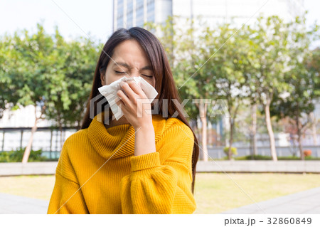 Asian woman use of the tissue 32860849