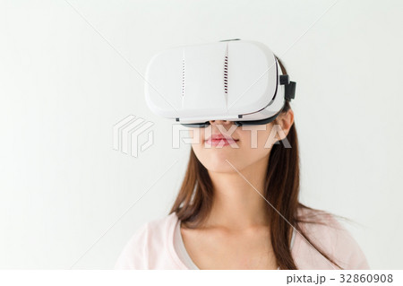 Woman watching though VR device 32860908