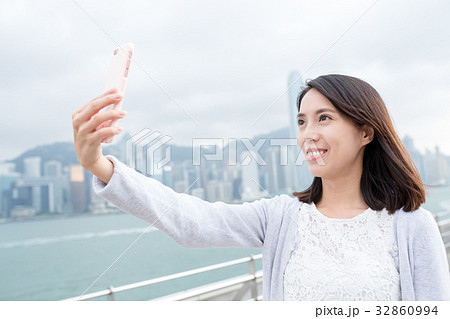 Woman take selfie at outdoor 32860994