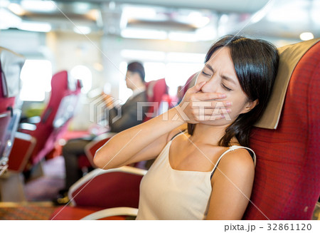 Woman feeling sick on boat Woman feeling sick on boat 32861120