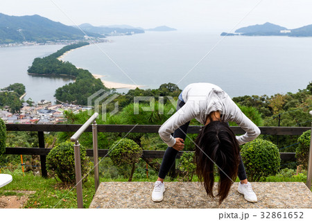 Woman upside down and viewing of Amanohashidate in Kyoto 32861652