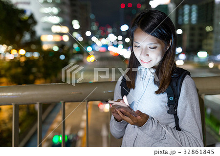 Woman using cellphone in Nagoya city Woman using cellphone in Nagoya city 32861845