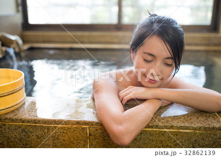 Woman enjoy indoor hot spings Woman enjoy indoor hot spings 32862139