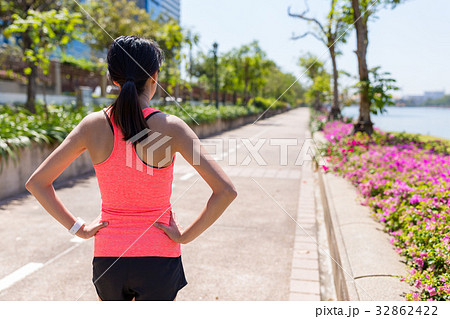 Sport woman running in a park 32862422