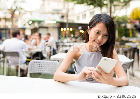 Woman wait for food in outdoor food market 32862528