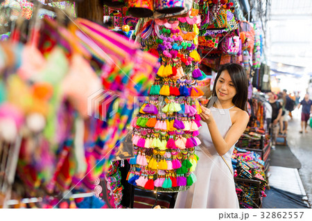 Young woman shopping at street market 32862557
