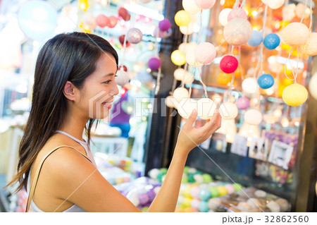 Woman shopping at weekend market 32862560