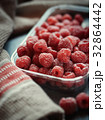 Fresh raspberries in a disposable plate 32864442