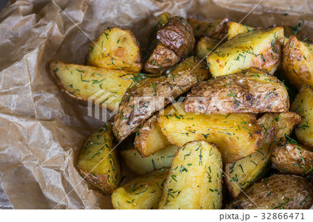 Potato country style with dill on wooden 32866471