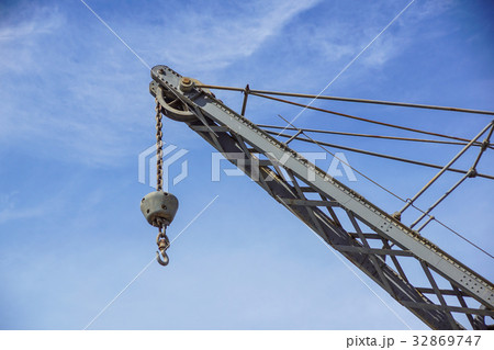 A crane on the floating dock in the harbor .Plenty 32869747