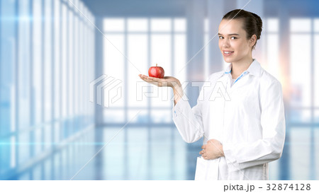 Beautiful medical woman doctor in uniform. Studio 32874128