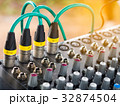 Jack Microphone on audio sound mixer console. 32874504