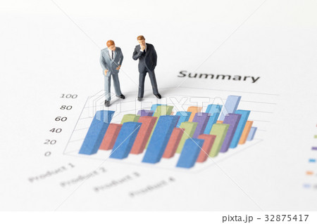 Miniature model of businessman thinking business 32875417