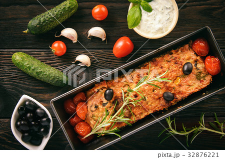 Meatloaf, greek style kitchen, on black background 32876221