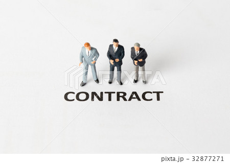 Miniature model of businessman standing contract Miniature model of businessman standing contract 32877271