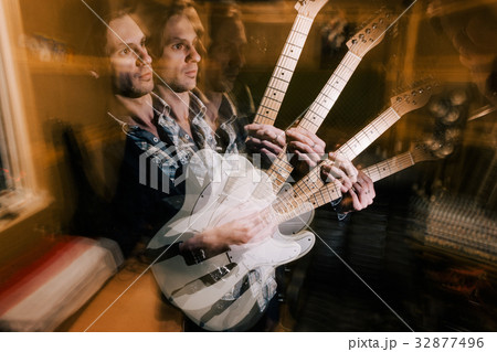 Creative guitarist portrait in double exposure Creative guitarist portrait in double exposure 32877496
