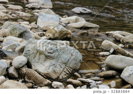 Large rocks in river water. Carpathians, Ukraine Large rocks in river water. Carpathians, Ukraine 32883884