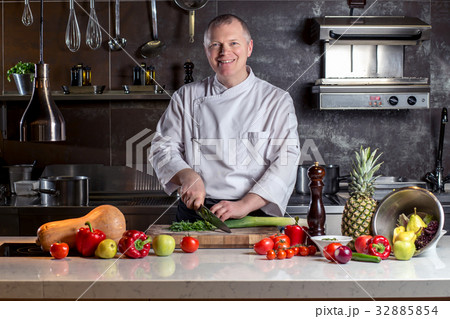 chef cutting with knife preparation preparing chef cutting with knife preparation preparing 32885854