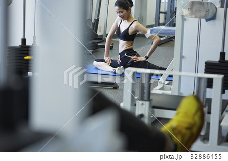 A photo of a girl in sportswear at fitness club A photo of a girl in sportswear at fitness club 32886455