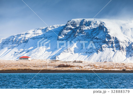Coastal Icelandic landscape with snowy mountains Coastal Icelandic landscape with snowy mountains 32888379