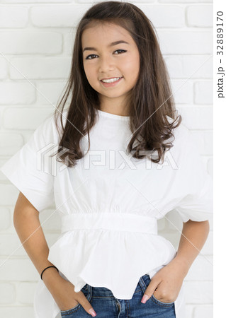 Portrait of happy cute girl smiling looking at camera. Portrait of happy cute girl smiling looking at camera. 32889170