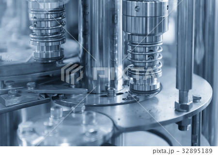 The bottle filling production machine. 32895189