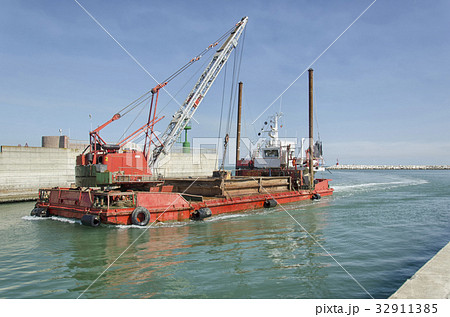 Dredger coming into port 32911385
