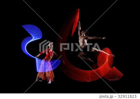 Attractive couple ballet dancer with lights Attractive couple ballet dancer with lights 32911823