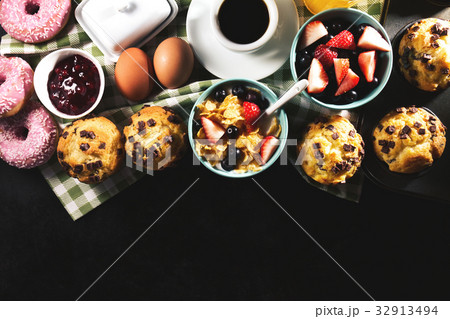 Tasty fresh breakfast food ingredients on black  32913494