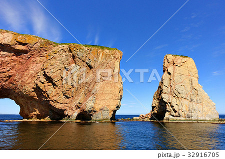 Close up view of Perce Rock at high tide Close up view of Perce Rock at high tide 32916705