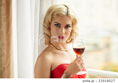 Having glass of wine Having glass of wine 32918027