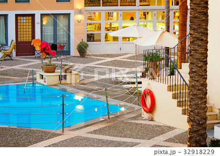 Inner courtyard with a small pool at the resort. Inner courtyard with a small pool at the resort. 32918229