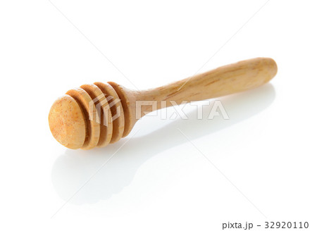 wooden honey stick isolated on white background 32920110