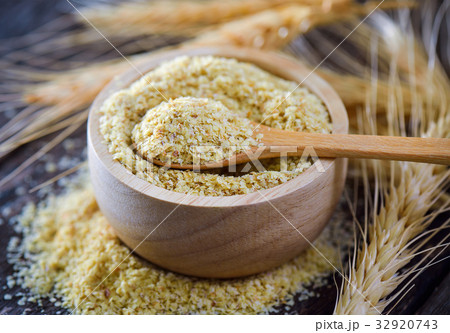 Wheat germ in wood bowl 32920743