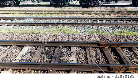 Rails from the train window as a background 32930139